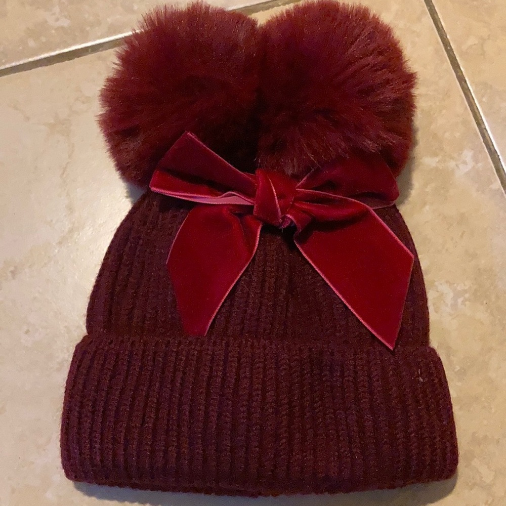 Burgundy fox pompom hat with velvet bow detail